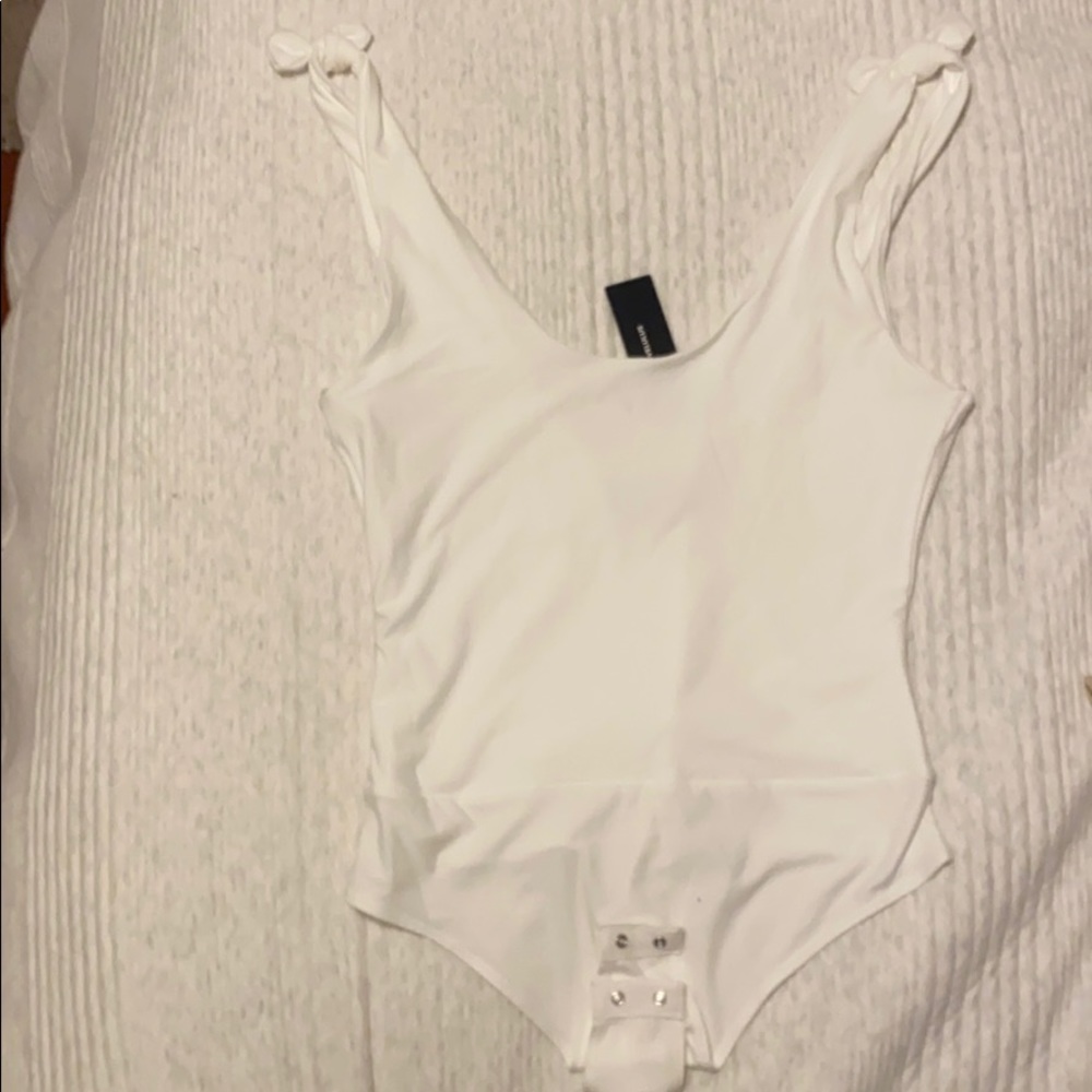 Pretty Pleased White Tie-Strapped Bodysuit Lulus